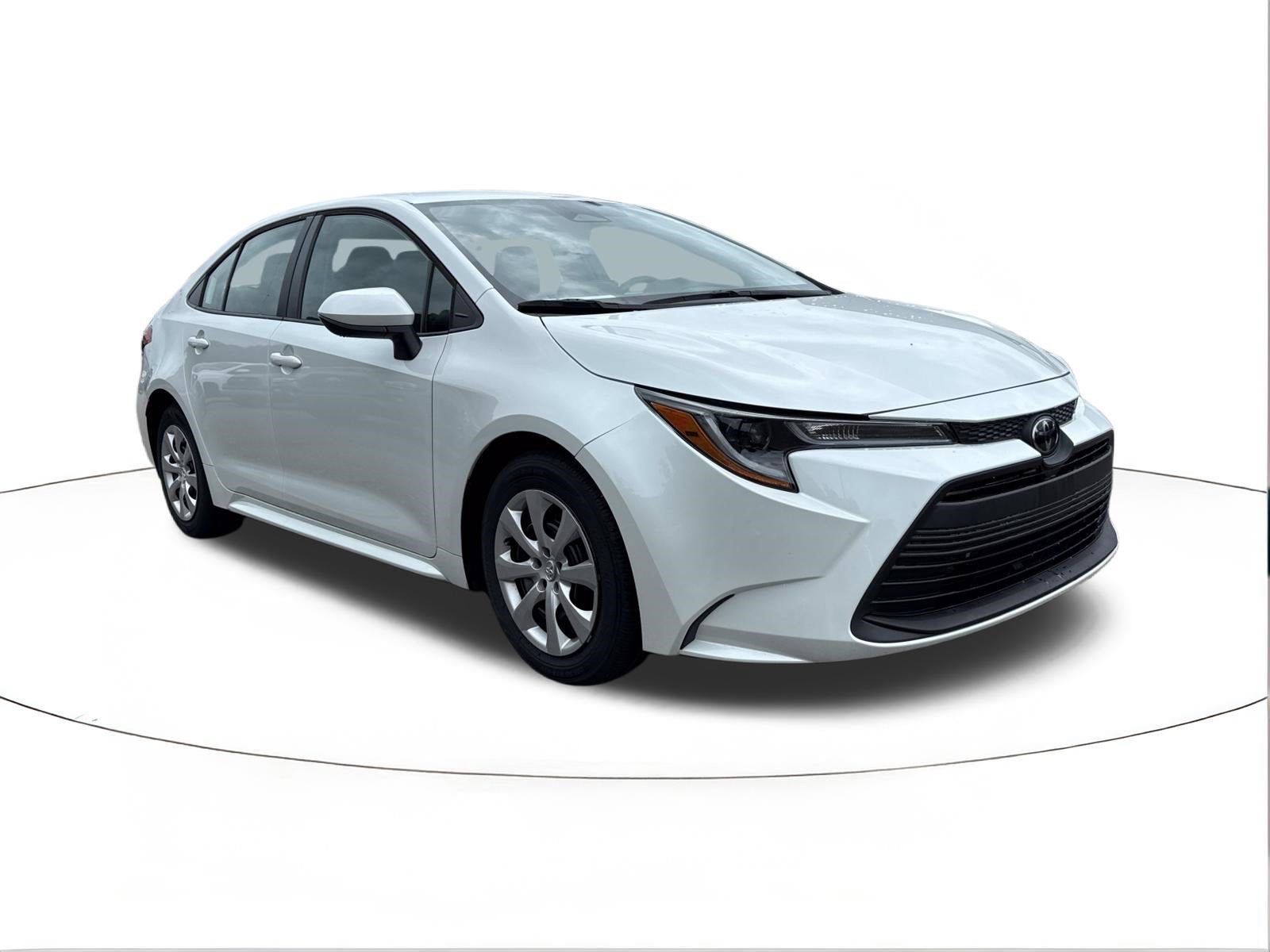 2023 Toyota Corolla LE in Wind Chill Pearl — front three-quarter view